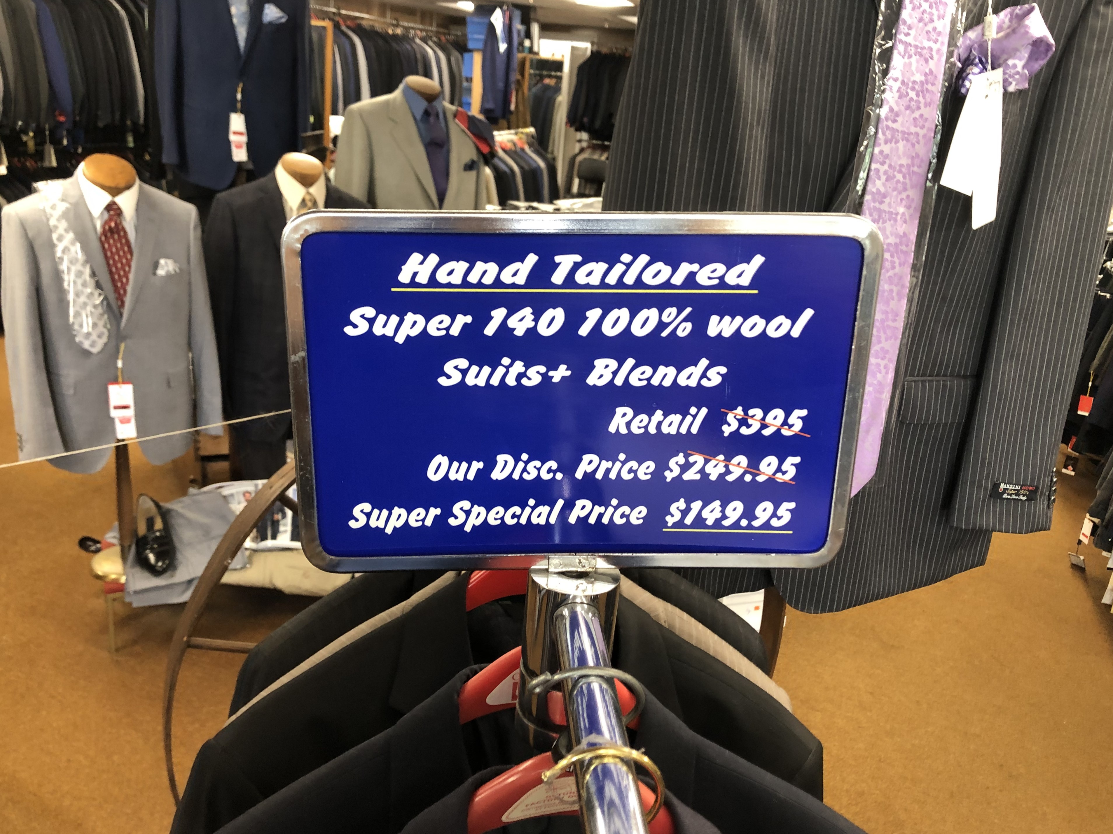 Tailored suits and special pricing display